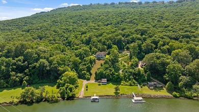 Experience exceptional waterfront living in this custom-built - photo 5