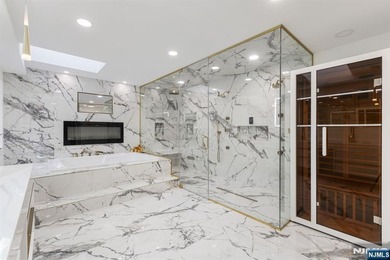 Welcome to this striking, fully-renovated modern masterpiece set - photo 11