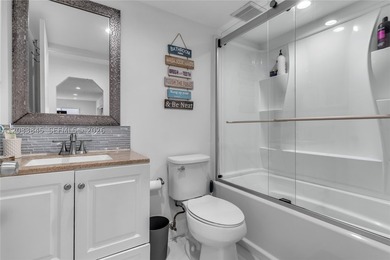 Welcome to this lovely and inviting 4-bedroom, 3-bathroom home - photo 12