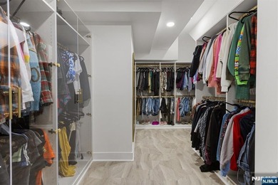 Welcome to this striking, fully-renovated modern masterpiece set - photo 13