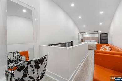Welcome to this striking, fully-renovated modern masterpiece set - photo 14
