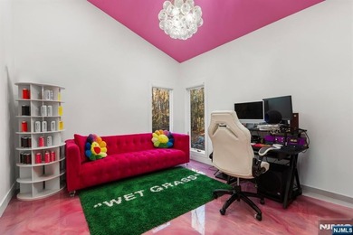 Welcome to this striking, fully-renovated modern masterpiece set - photo 17