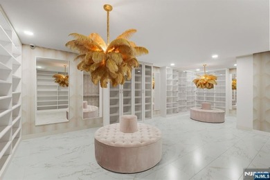 Welcome to this striking, fully-renovated modern masterpiece set - photo 18