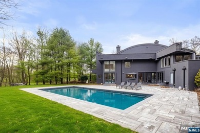 Welcome to this striking, fully-renovated modern masterpiece set - photo 19