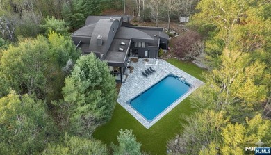 Welcome to this striking, fully-renovated modern masterpiece set - photo 20