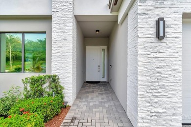 Welcome to this stunning two-story residence in Lotus, Boca - photo 4