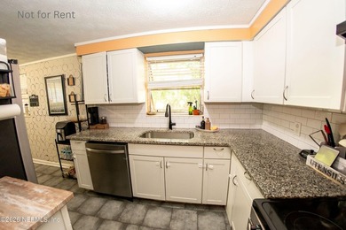 Recently remodeled gem. Granite Countertops. New Dishwasher and - photo 2