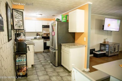 Recently remodeled gem. Granite Countertops. New Dishwasher and - photo 4