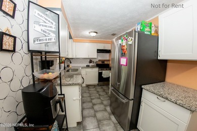 Recently remodeled gem. Granite Countertops. New Dishwasher and - photo 5