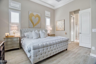 Experience sophisticated villa living in this gated North