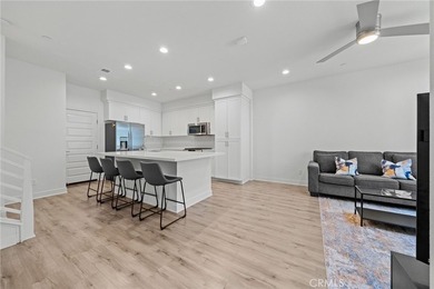 Built in 2021, this highly desirable two-story townhome offers 3 - photo 2