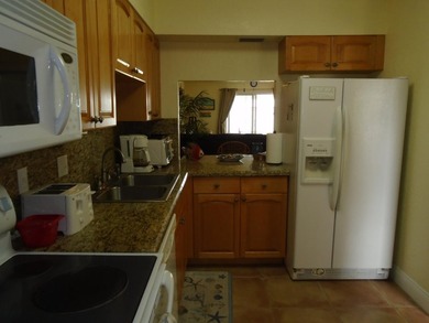 Beautiful waterfront first floor corner unit. Great water view - photo 3