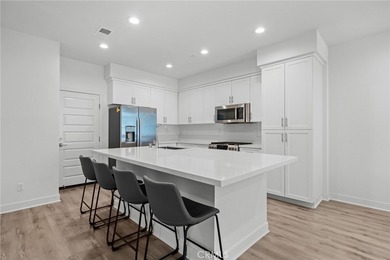 Built in 2021, this highly desirable two-story townhome offers 3 - photo 5