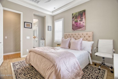 Experience sophisticated villa living in this gated North