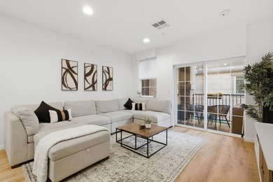 Welcome to 88 N Jackson Ave #211, a beautifully upgraded and