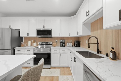 Welcome to 88 N Jackson Ave #211, a beautifully upgraded and