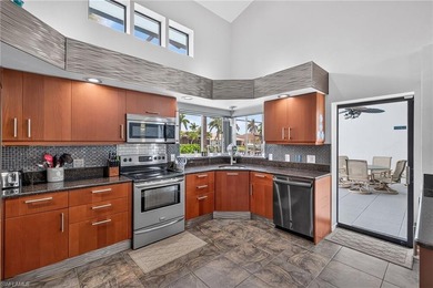 Stunning waterfront pool home with an expansive living area and - photo 11