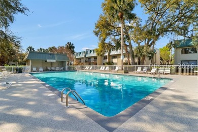 Just steps from the beach, Surf Court is one of the island's - photo 27
