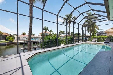 Stunning waterfront pool home with an expansive living area and - photo 27