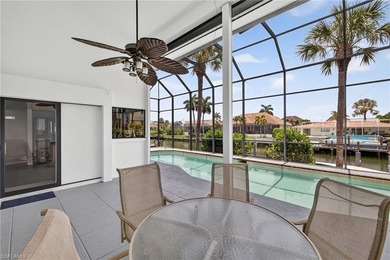 Stunning waterfront pool home with an expansive living area and - photo 30