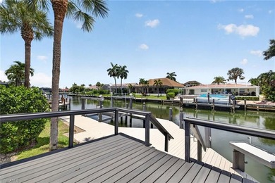 Stunning waterfront pool home with an expansive living area and - photo 32
