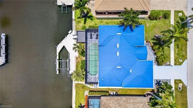 Stunning waterfront pool home with an expansive living area and - photo 34
