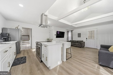 Experience lakefront living with this beautifully renovated home - photo 11