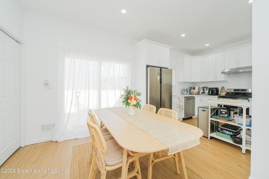 Fully gut-renovated 3 bedroom home in heart of 10309. Features a - photo 12
