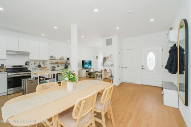 Fully gut-renovated 3 bedroom home in heart of 10309. Features a - photo 13