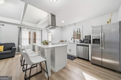 Experience lakefront living with this beautifully renovated home - photo 14
