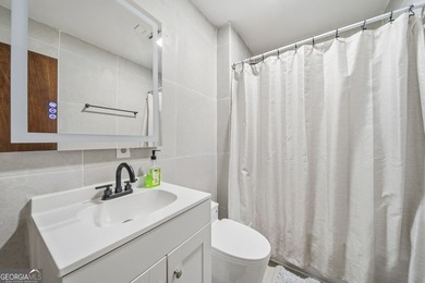 Experience lakefront living with this beautifully renovated home - photo 15