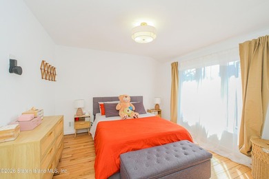 Fully gut-renovated 3 bedroom home in heart of 10309. Features a - photo 20