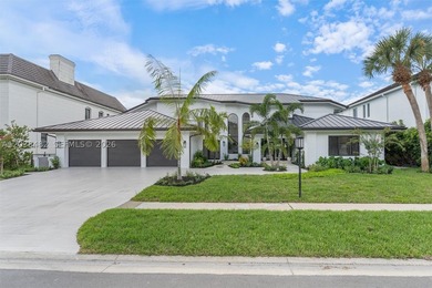 Located in Boca Grove, this charming remodel features a - photo 2