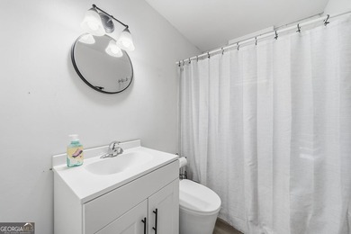 Experience lakefront living with this beautifully renovated home - photo 23