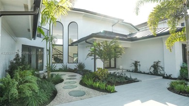 Located in Boca Grove, this charming remodel features a - photo 3