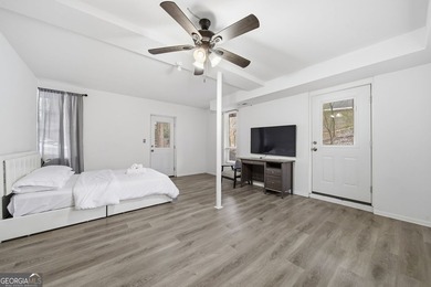 Experience lakefront living with this beautifully renovated home - photo 24