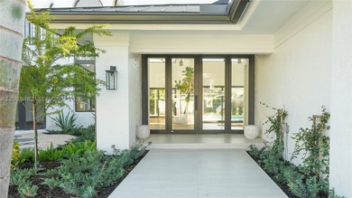 Located in Boca Grove, this charming remodel features a - photo 4