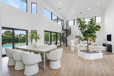 Located in Boca Grove, this charming remodel features a - photo 6