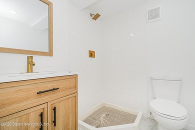 Fully gut-renovated 3 bedroom home in heart of 10309. Features a - photo 26