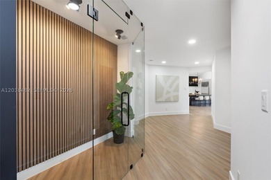 Located in Boca Grove, this charming remodel features a - photo 8