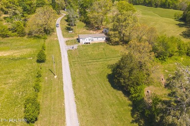 Unrestricted Country Living Meets Modern Comfort: Your 1-Acre - photo 1
