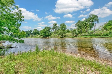Welcome to peaceful riverfront living at its finest. This - photo 1