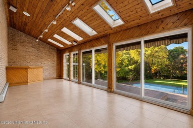 A truly irreplaceable offering on Todt Hill, this extraordinary - photo 18