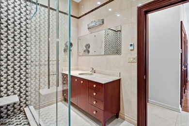 A truly irreplaceable offering on Todt Hill, this extraordinary - photo 21