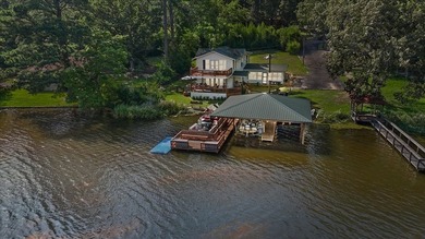 Wonderful rustic waterfront home on lake Lydia nestled along the - photo 1