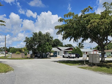 Rare oversized corner lot! Handyman Special. Needs a lot of - photo 1
