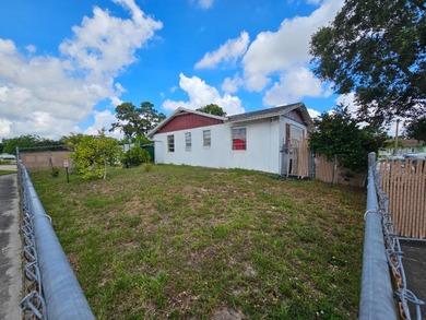 Rare oversized corner lot! Handyman Special. Needs a lot of - photo 3