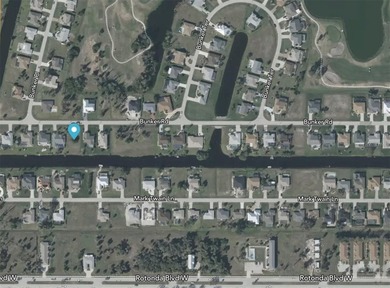 Build your dream home on this beautiful canal-front lot in the - photo 3