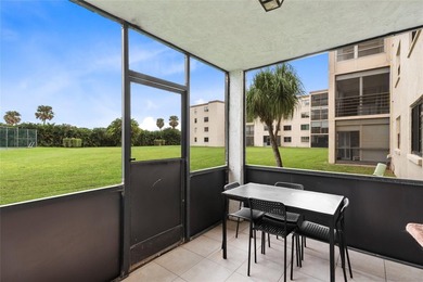 Welcome to this stunning 2-bed 2-bath condo located on the first - photo 3