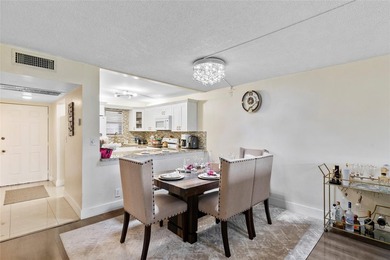 Welcome to this stunning 2-bed 2-bath condo located on the first - photo 4